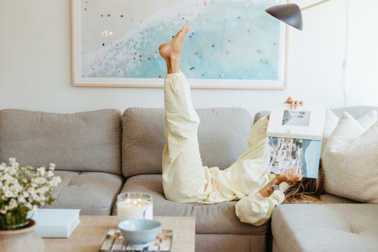 woman reading on couch