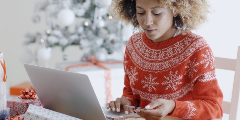 woman shopping best black friday deals on her computer